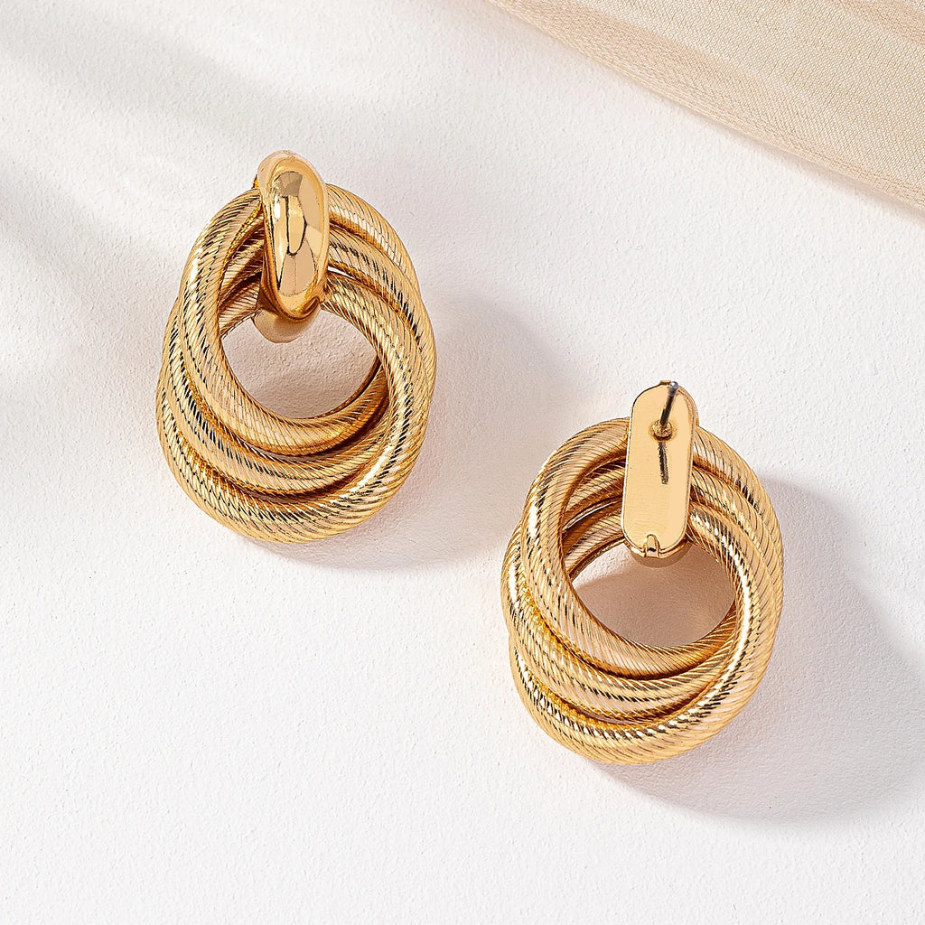 A Pair of Fashionable Bohemian Style Earrings and Jewelry