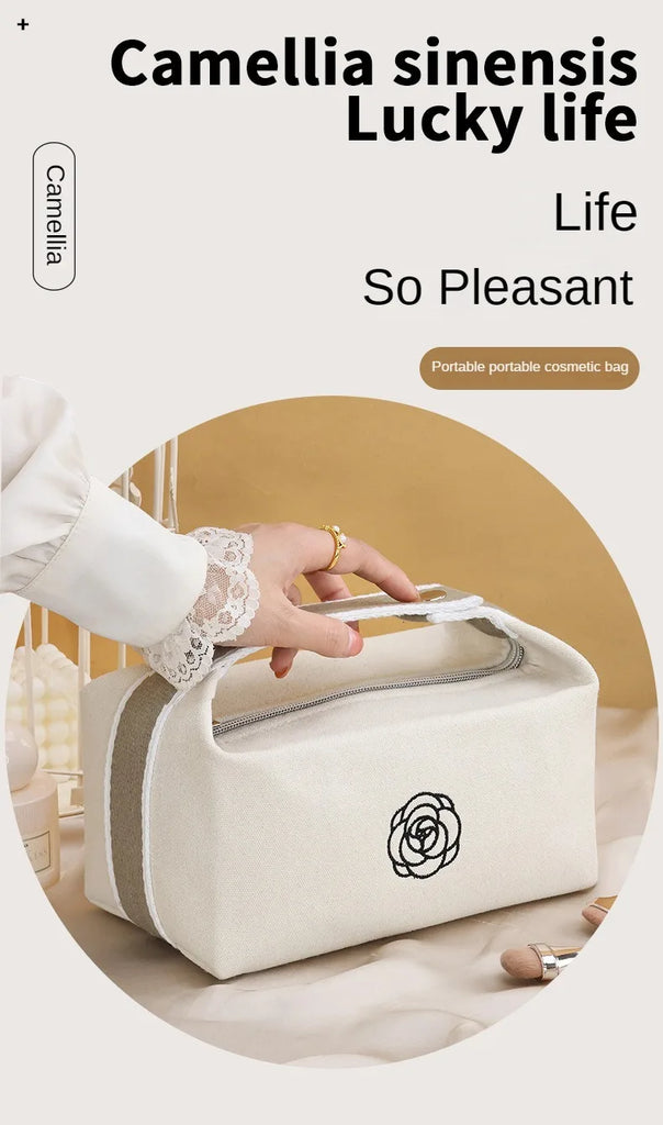 Premium Handheld Camellia Canvas Makeup Bag – Large‑Capacity Travel Toiletry & Skincare Organizer