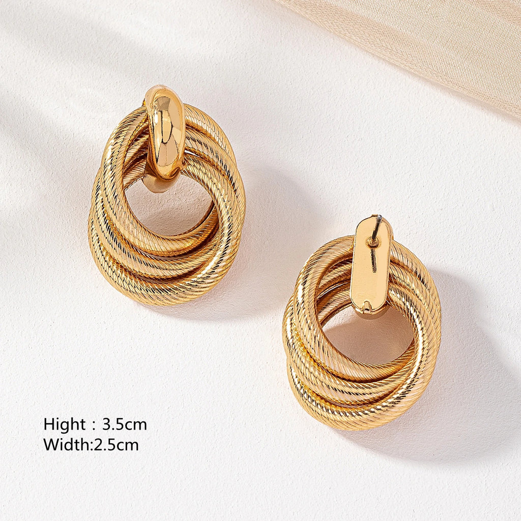 A Pair of Fashionable Bohemian Style Earrings and Jewelry