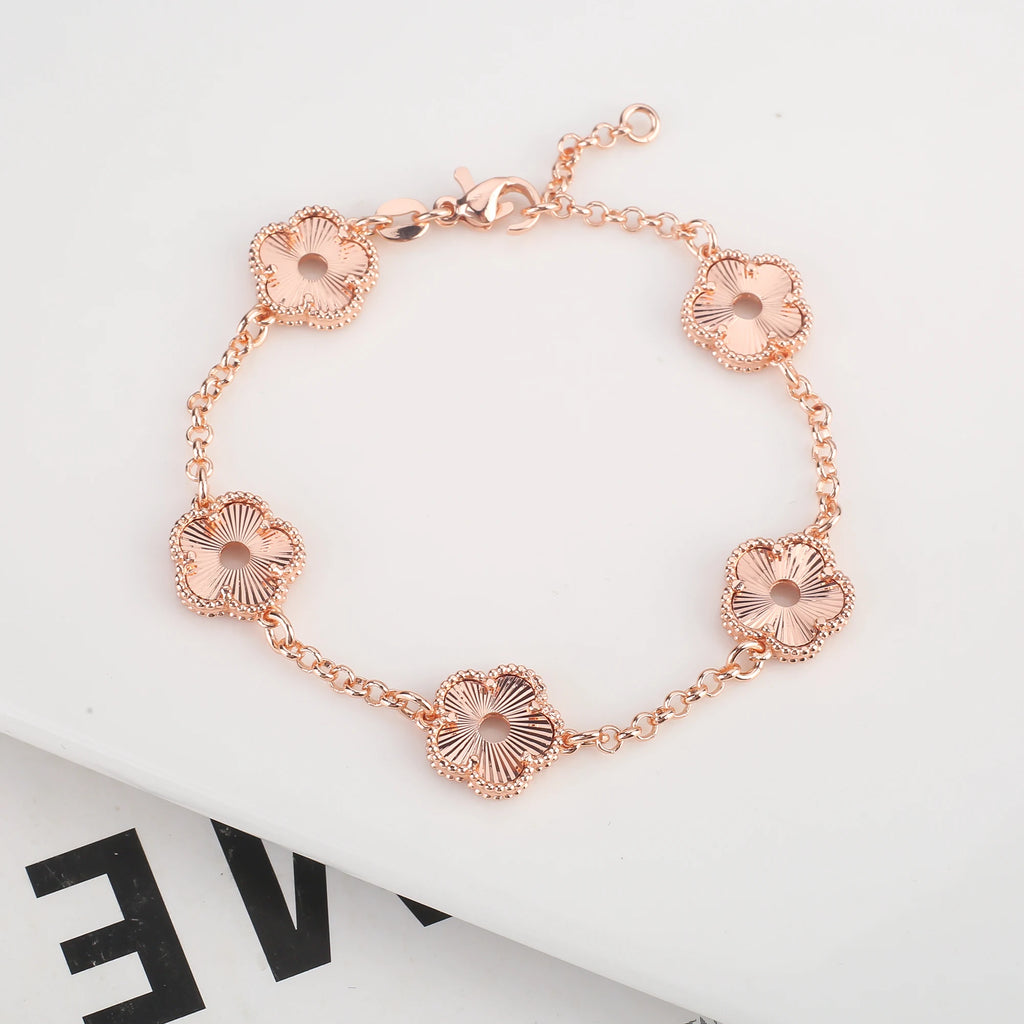 Hollow Metal Double sided Hollow Jewelry Set Sparkling Hot Selling Plum Blossom Jewelry Set Creative New Design For Women Clover
