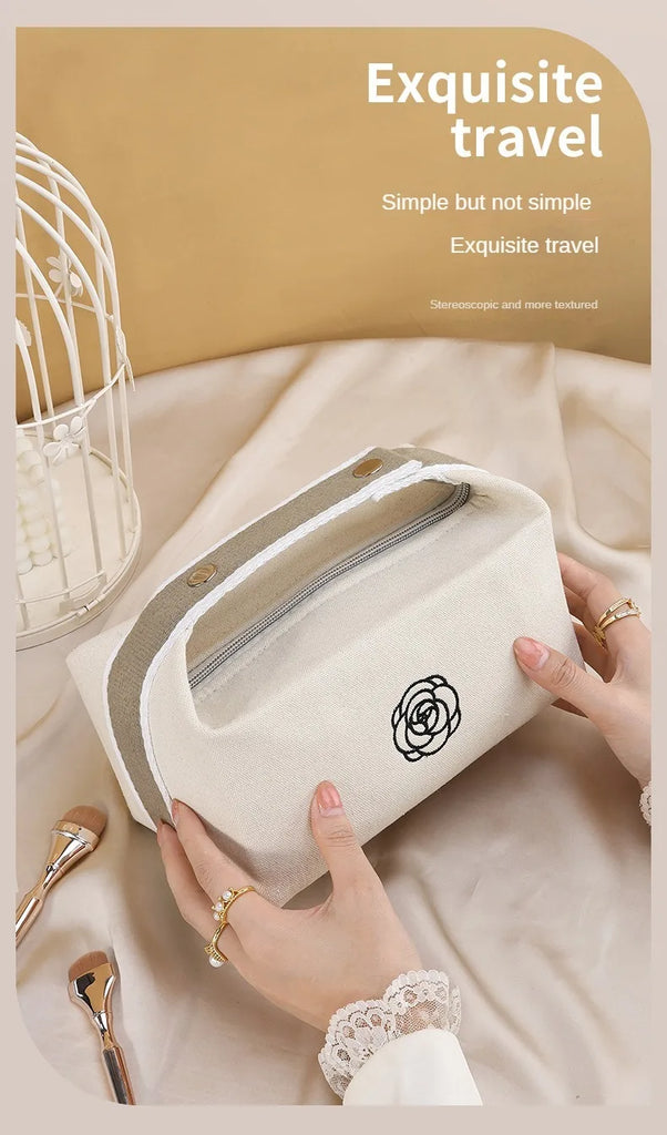 Premium Handheld Camellia Canvas Makeup Bag – Large‑Capacity Travel Toiletry & Skincare Organizer