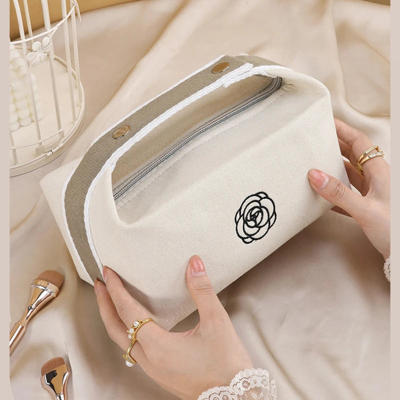 Premium Handheld Camellia Canvas Makeup Bag – Large‑Capacity Travel Toiletry & Skincare Organizer