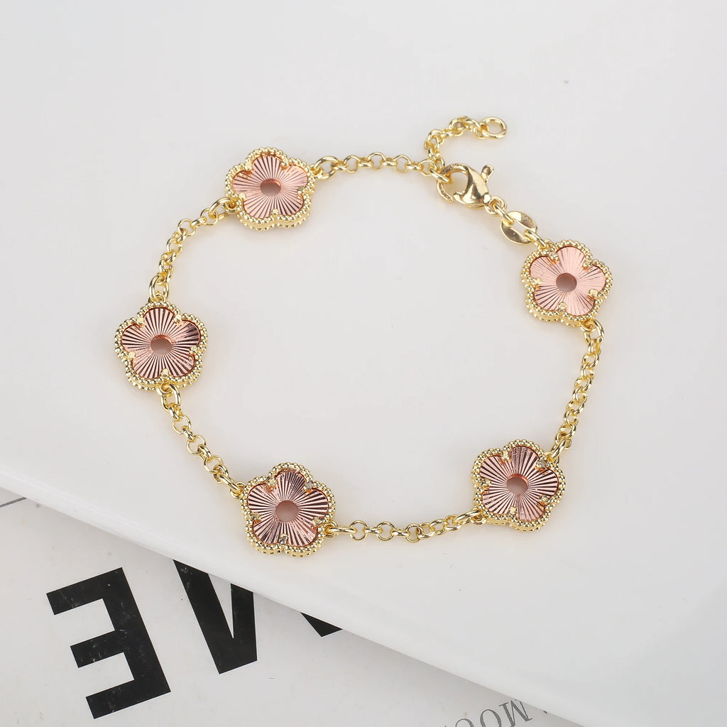 Hollow Metal Double sided Hollow Jewelry Set Sparkling Hot Selling Plum Blossom Jewelry Set Creative New Design For Women Clover