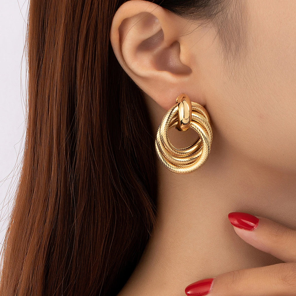A Pair of Fashionable Bohemian Style Earrings and Jewelry