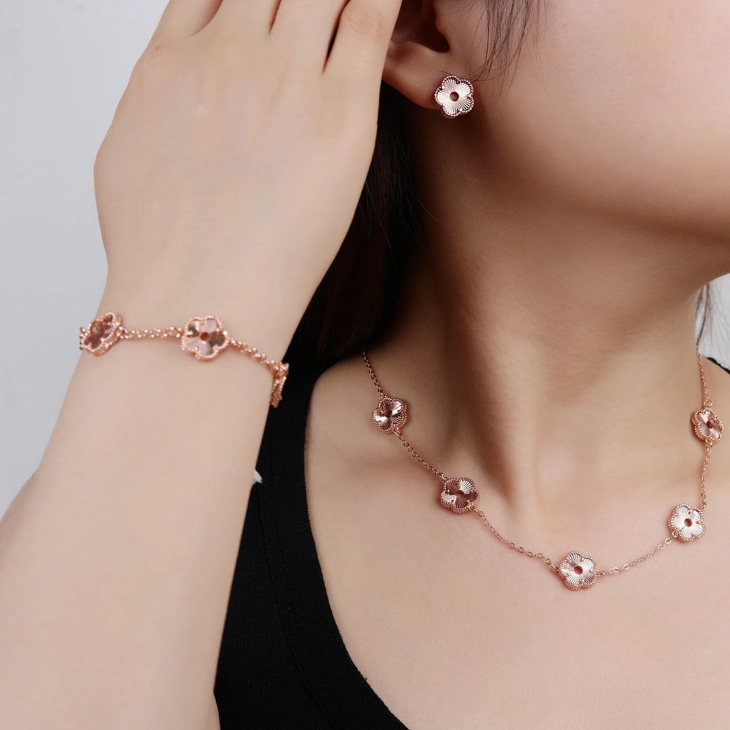 Hollow Metal Double sided Hollow Jewelry Set Sparkling Hot Selling Plum Blossom Jewelry Set Creative New Design For Women Clover