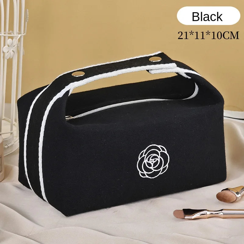 Premium Handheld Camellia Canvas Makeup Bag – Large‑Capacity Travel Toiletry & Skincare Organizer