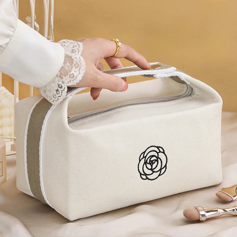 Premium Handheld Camellia Canvas Makeup Bag – Large‑Capacity Travel Toiletry & Skincare Organizer