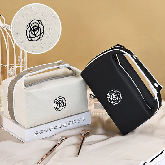 Premium Handheld Camellia Canvas Makeup Bag – Large‑Capacity Travel Toiletry & Skincare Organizer